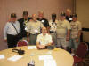 (079) No, it's not a poker game... we just finished a meeting regarding the 161AHC finances.  Standing:  Don Smith, Steve Hallmark, Larry Kenny, Pete Christy, James Price, Craig Chandler, Phil Crouse and Hartson Gleason.  Seated: John Hastings. 
